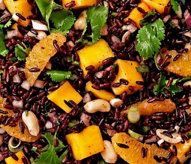 Black Rice Salad with Peanuts and Mango Slices - illustrating the variety of uses for cooking with black rice