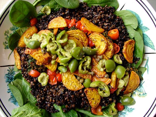 Black forbidden rice, black beluga lentils, onions, beans and other vegetables. See the great recipe collection here in this article