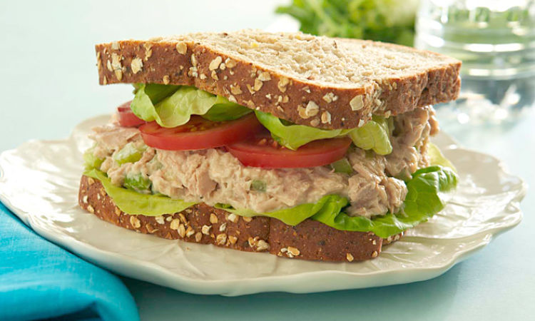 Fish canned in brine such as wild tuna or salmon is a healthy convenient ingredient for fresh sandwiches