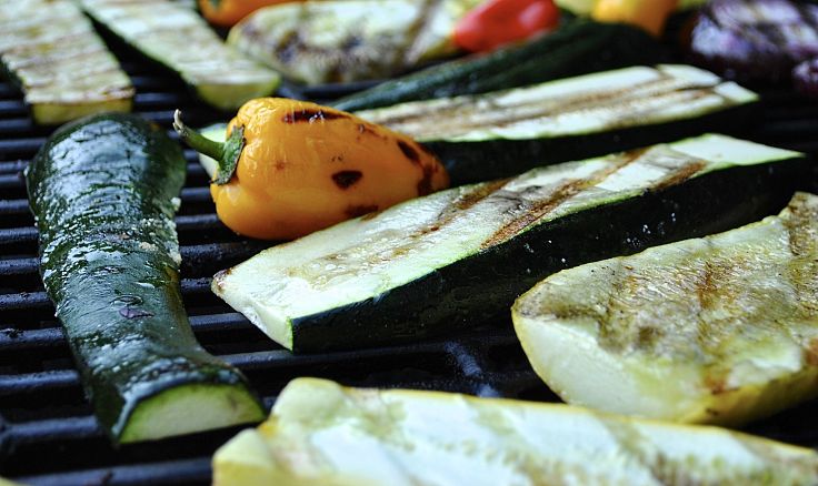 Many half-sections of vegetables can be grilled or barbecued directly on the grill grate surface 